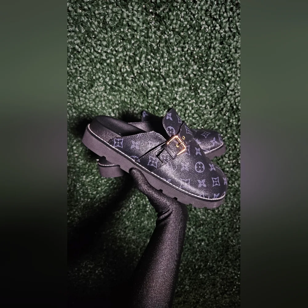 Louis Vuitton Black and Gold Loafers